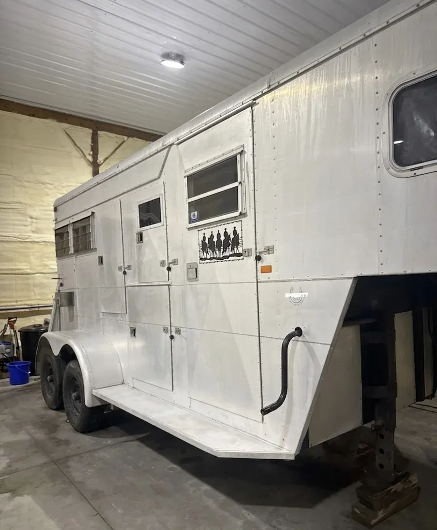 Aluminum gooseneck horse trailer after polishing in the shop